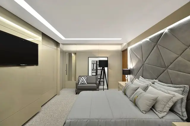Quarto amplo com carpete claro