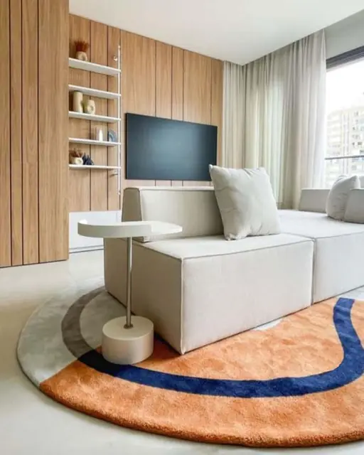 Sala de TV com tapete redondo personalizado